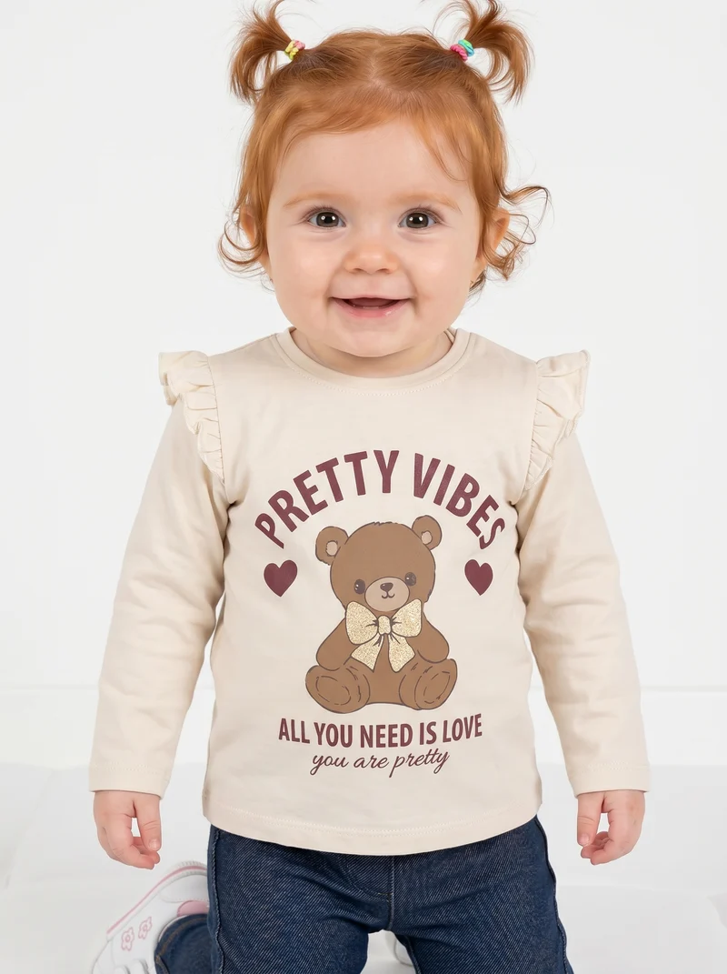 T-shirt a manica lunga con volant e stampa - Beige