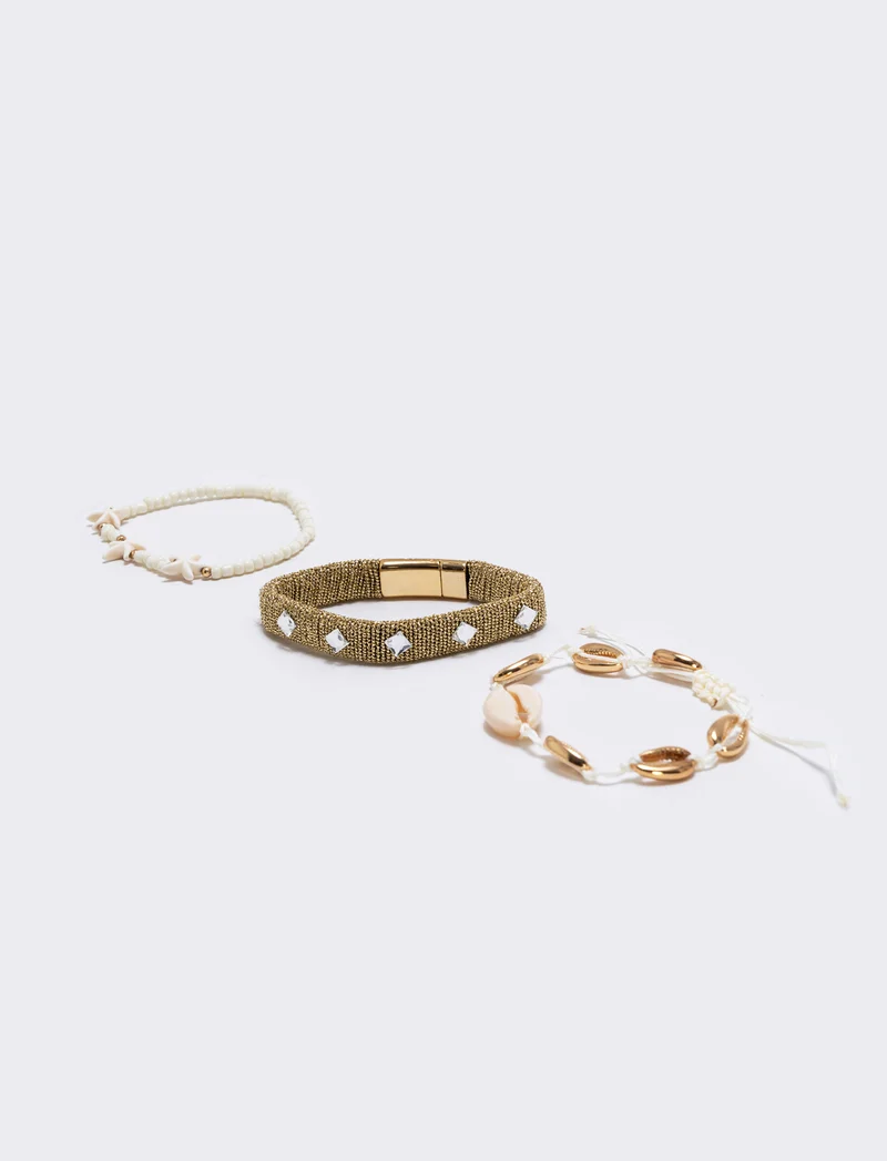 Bracciali conchiglie e stelle marine - Oro