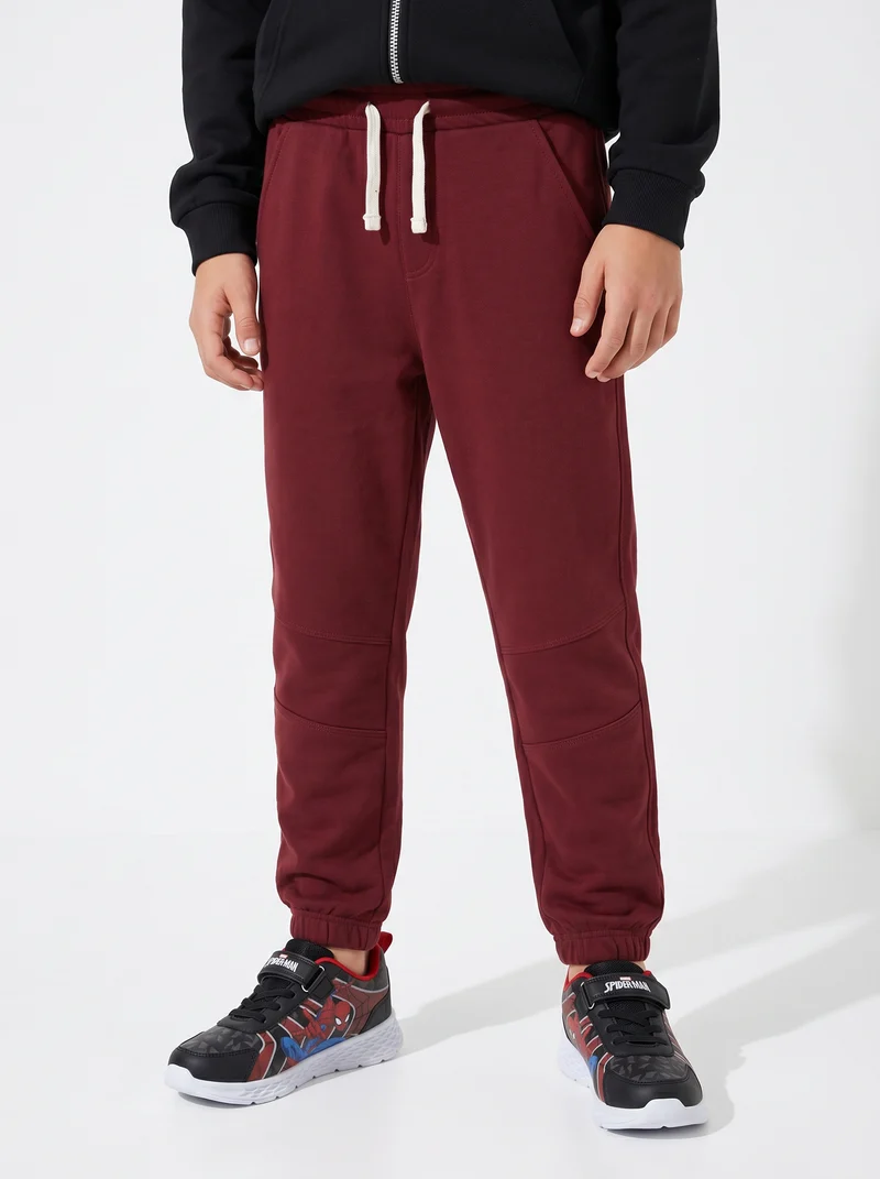 Pantaloni jogger in cotone comodi e pratici - Bordeaux