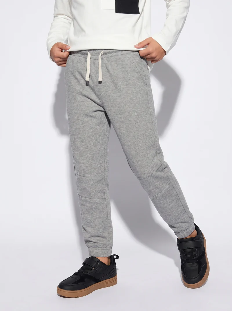 Pantaloni jogger in cotone comodi e pratici - Grigio mel.