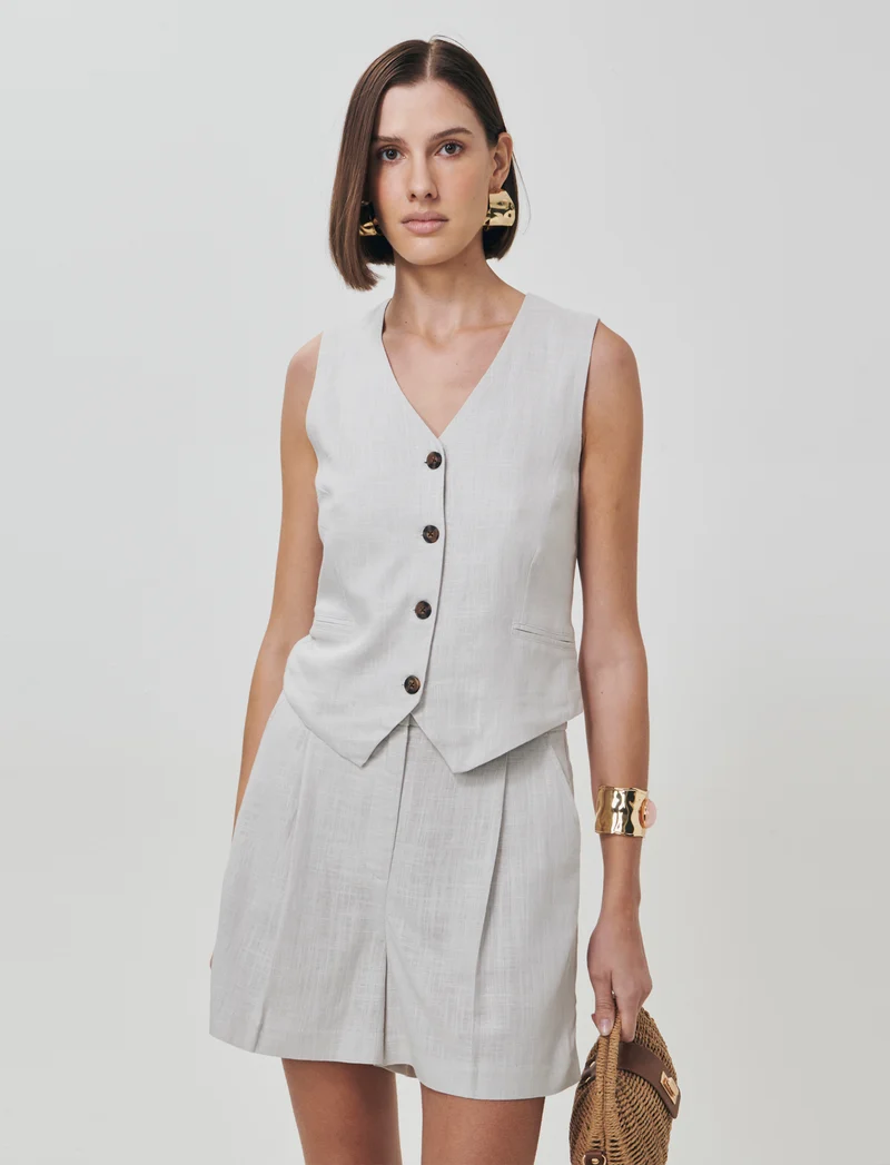 Gilet con tasche a taglio davanti - Sabbia