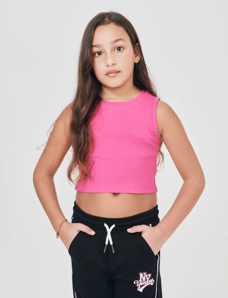 Top cropped in tessuto elastico girocollo - Fuxia