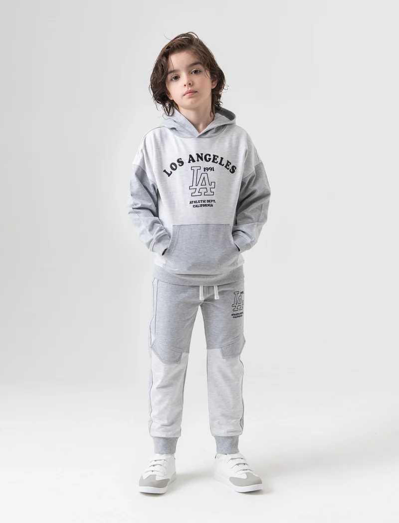 Jogger bicolor da bambino - Grigio mel.