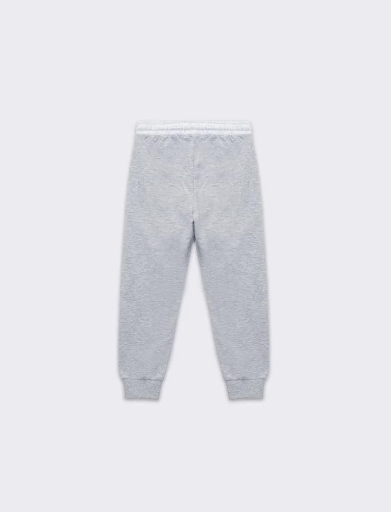 Jogger bicolor da bambino - Grigio mel.