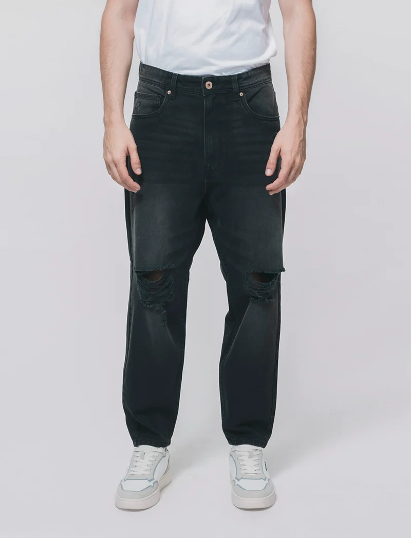 Jeans nero loose fit con strappi - Nero