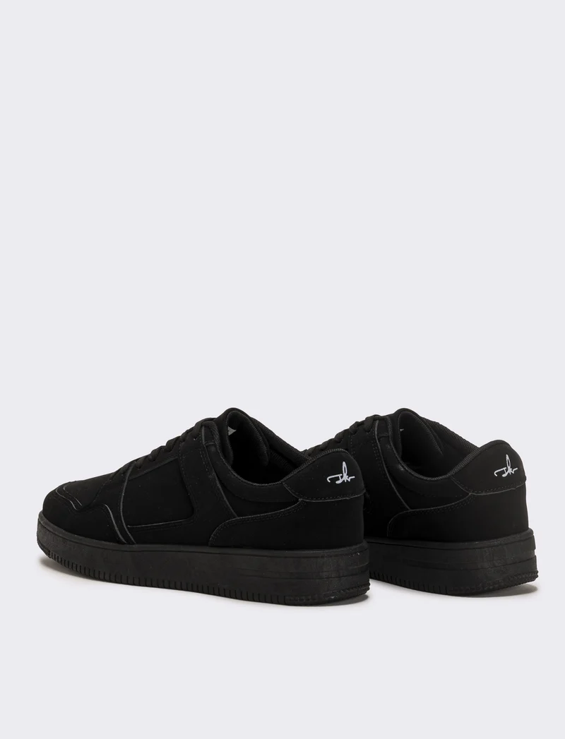 Sneakers monocolore da uomo - Nero