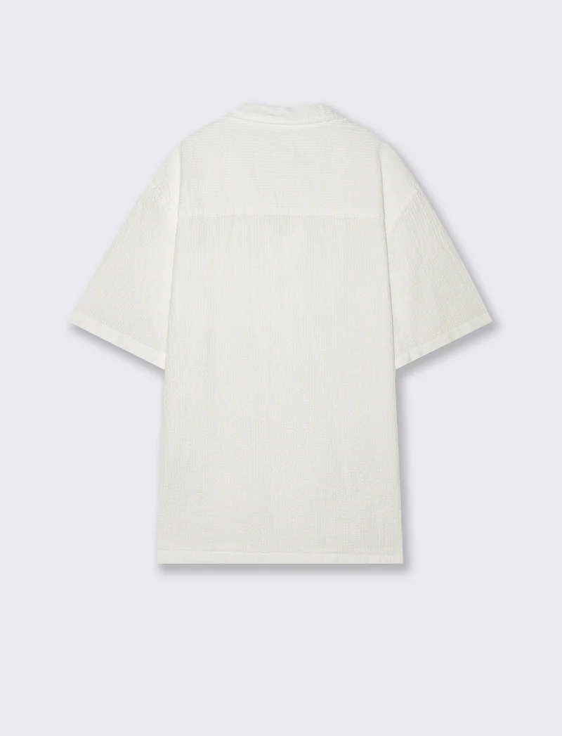 Polo jacquard effetto garza maniche corte - Bianco