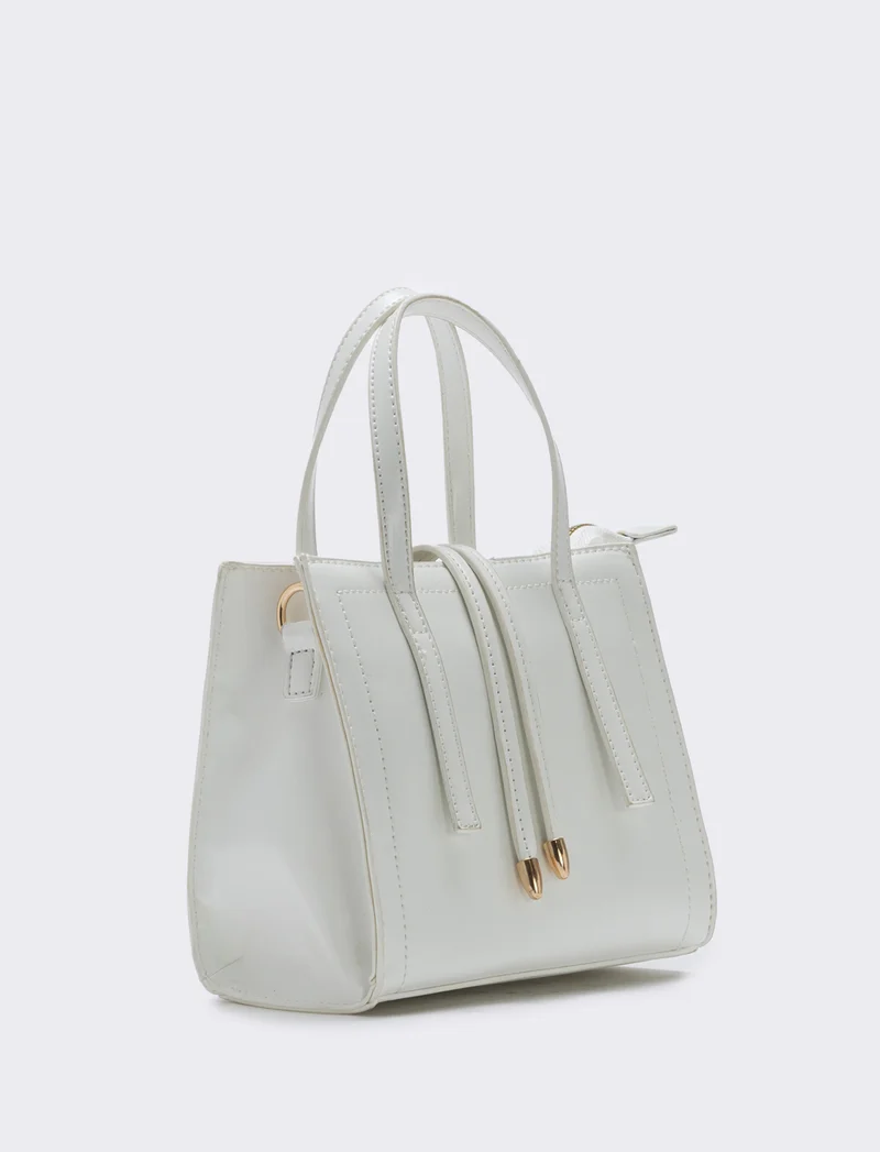 Borsa semirigida a mano con laccetti - Bianco