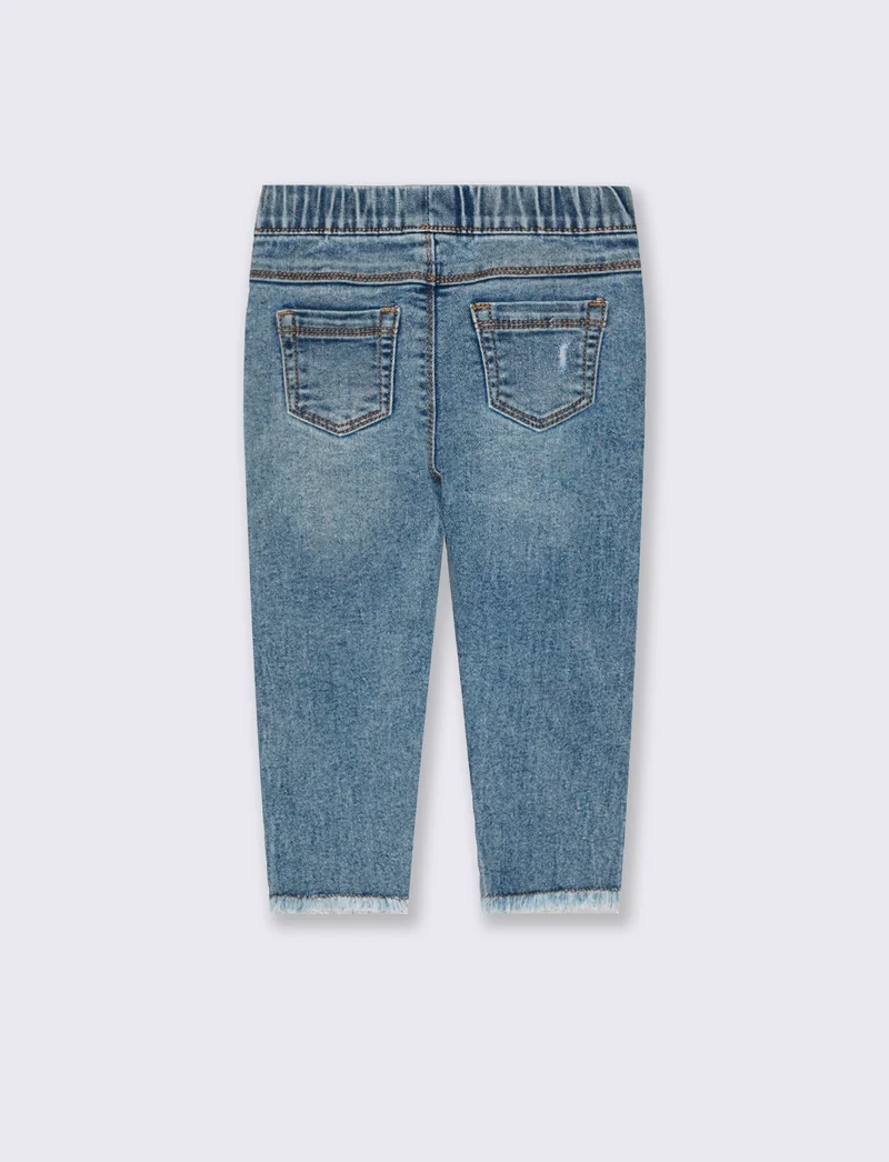 Jeans skinny con elastico e rotture - Denim chiaro