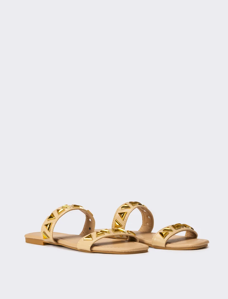 Mule da donna con borchie - Beige