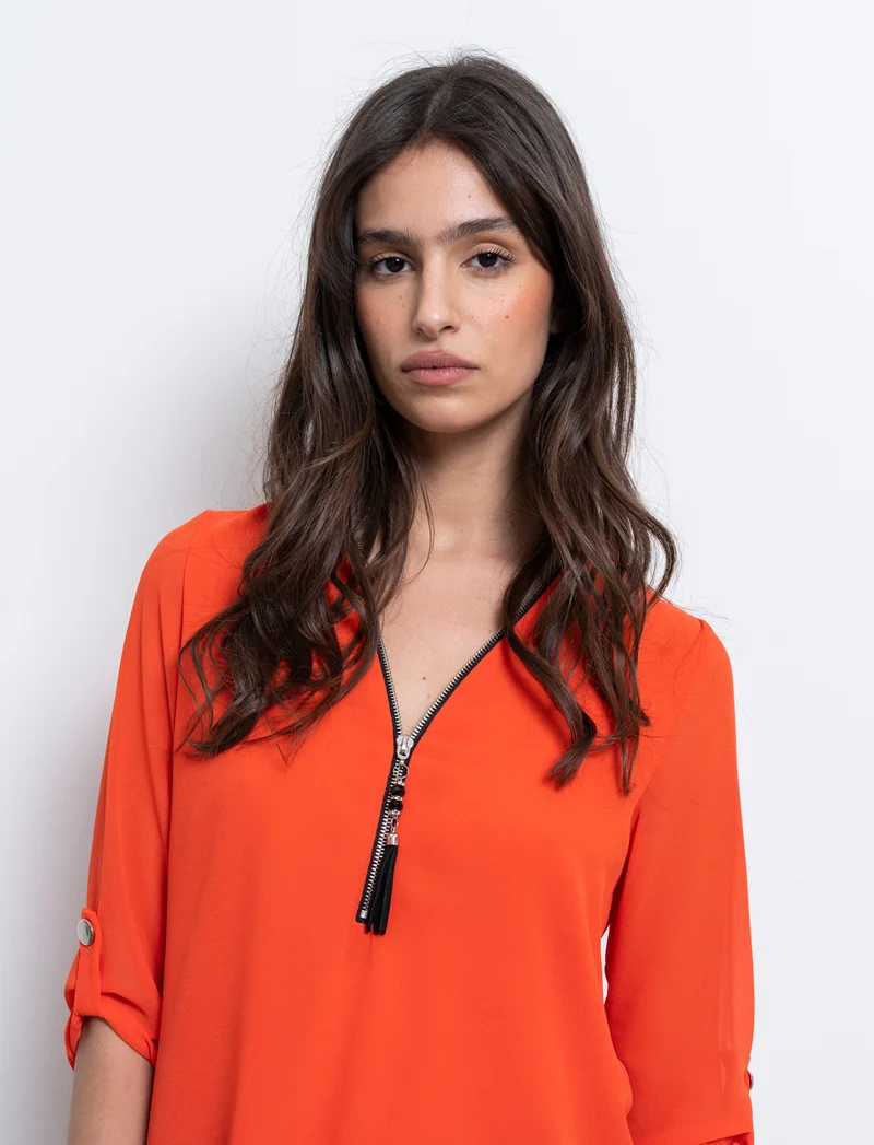 Casacca manica 3/4 con bottone e zip sul davanti. - Arancio