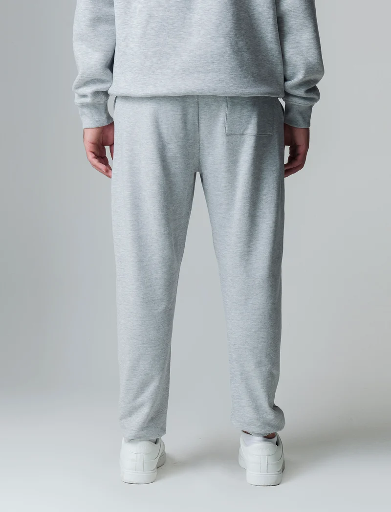 Pantaloni jogger basic in felpa da uomo - Grigio mel.