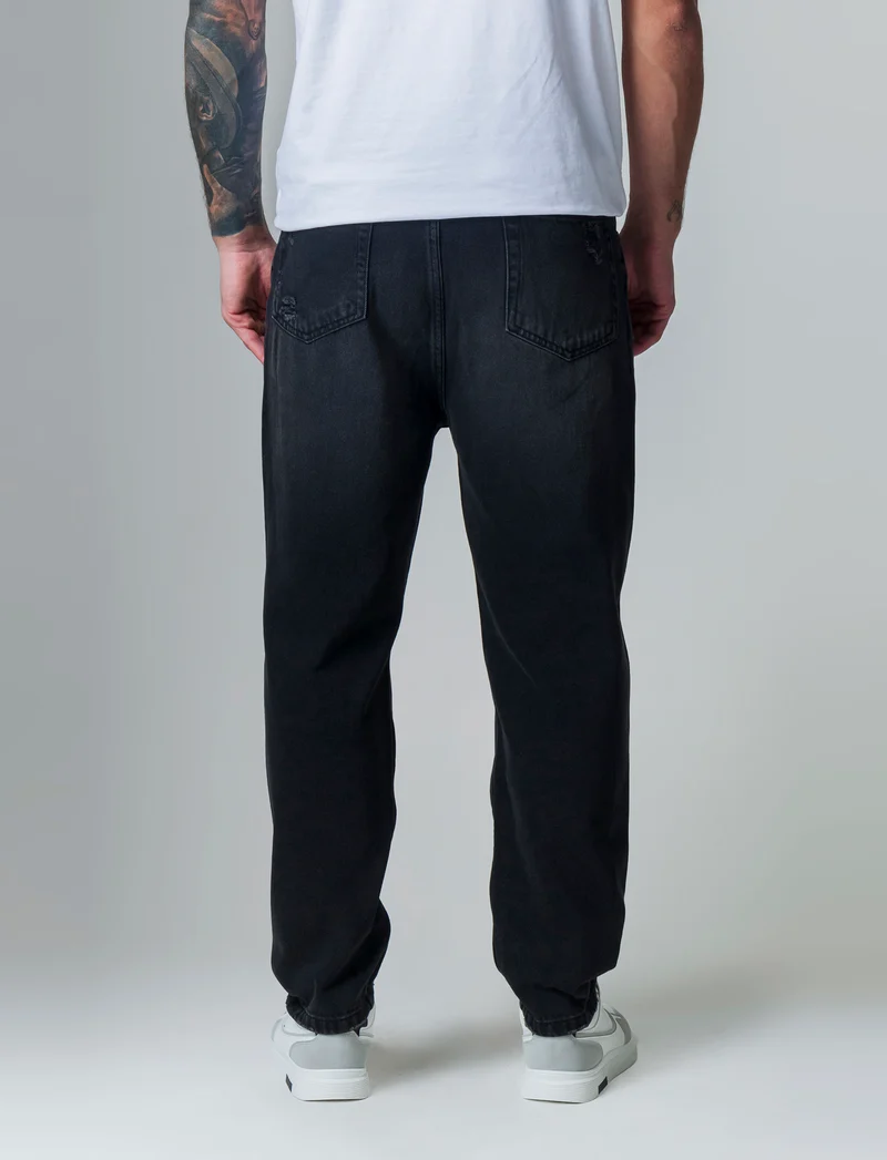 Jeans nero loose fit con strappi da uomo - Nero