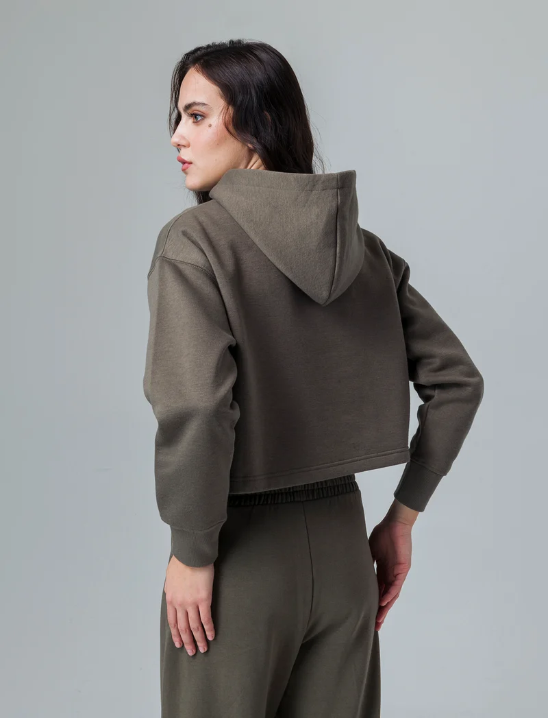 Felpa crop con cappuccio da donna - Verde salvia