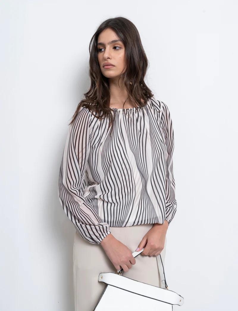 Blusa ampia in tessuto leggero con stampa e fiocco su una spalla. - Bianco-nero