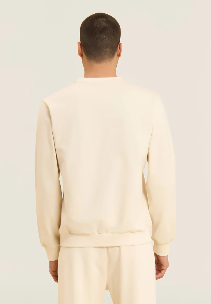 Crew neck sweatshirt with tone-on-tone "TRAINING" print - White Swan