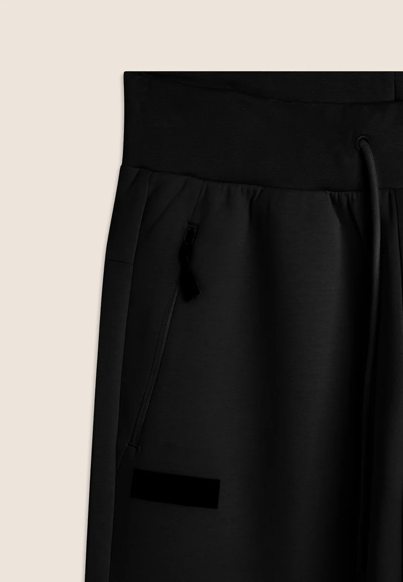 Urban tech athletic trousers with elasticated bottom hem - Black