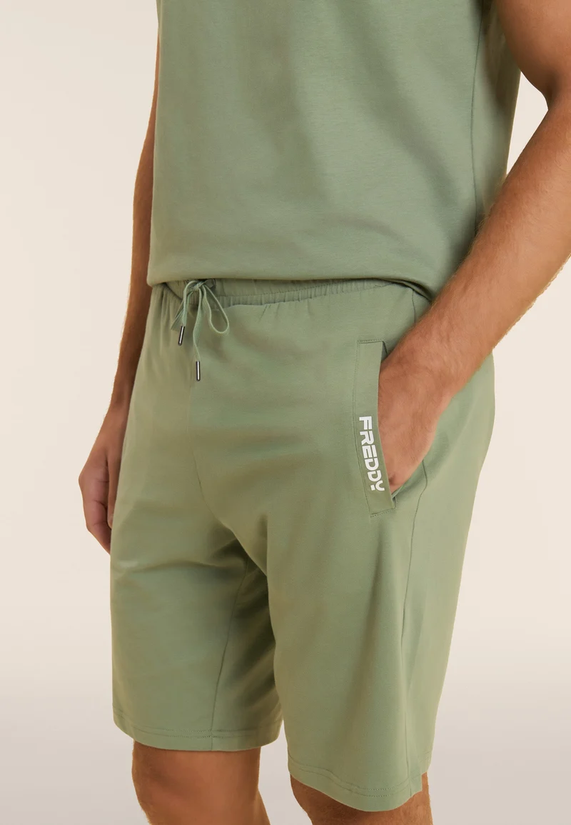 Stretch jersey shorts with breast pocket - Hedge Green