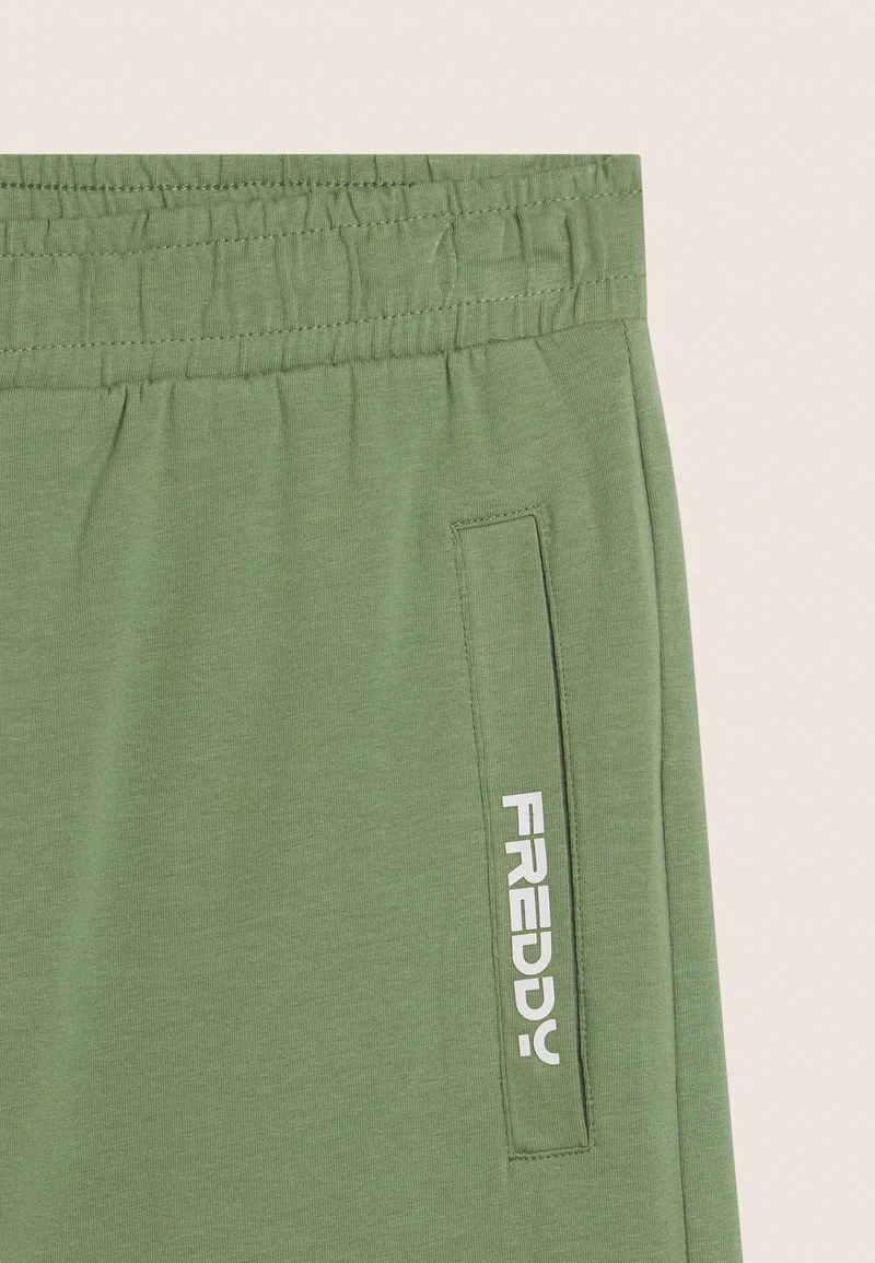 Stretch jersey shorts with breast pocket - Hedge Green