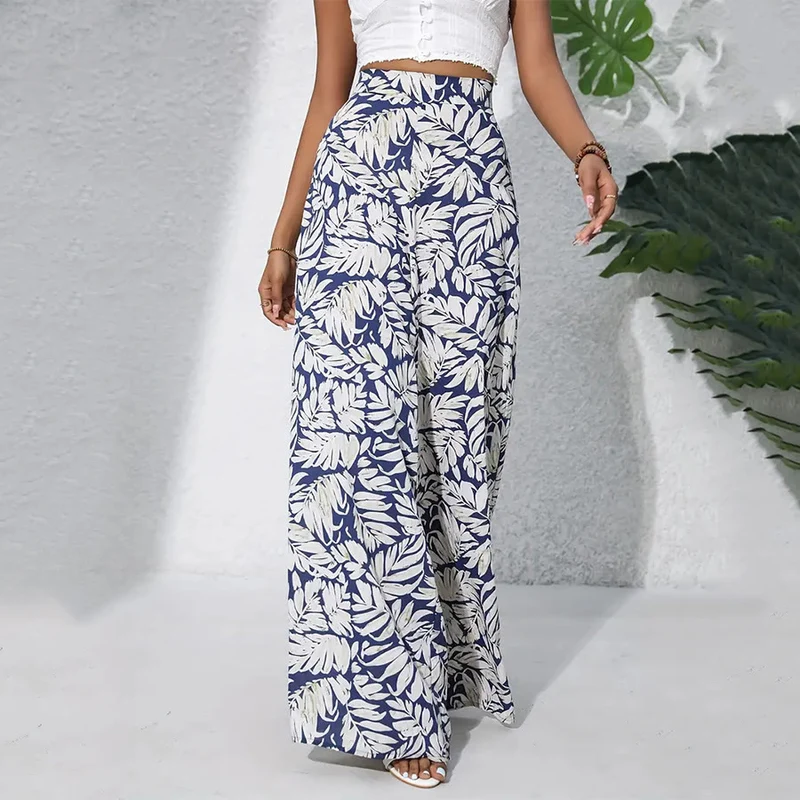 Olivenorma Damenhose mit tropischem Blätterprint, hohem Bund und weitem Bein