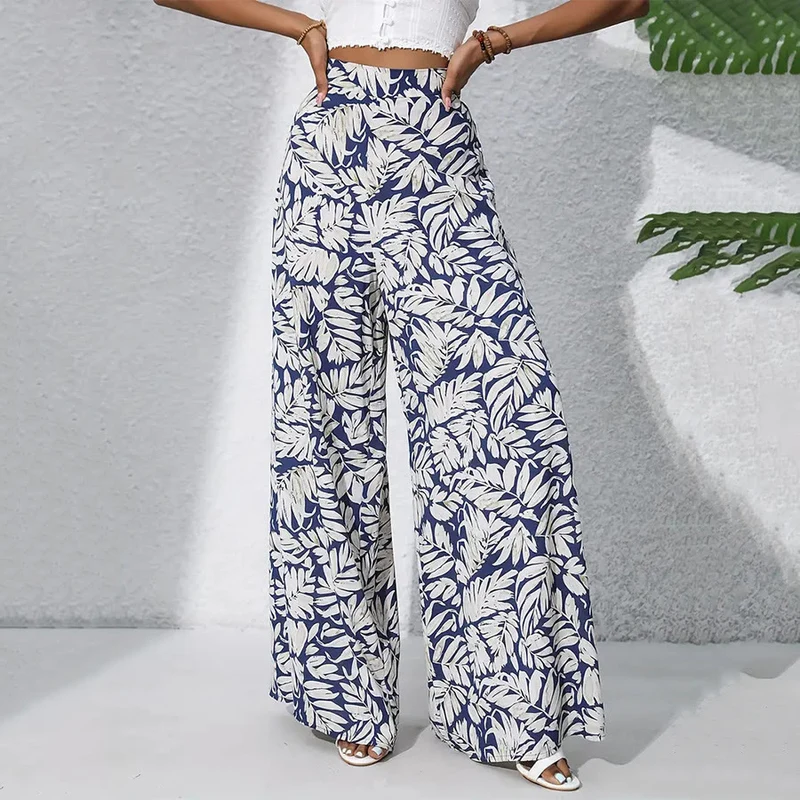 Olivenorma Damenhose mit tropischem Blätterprint, hohem Bund und weitem Bein