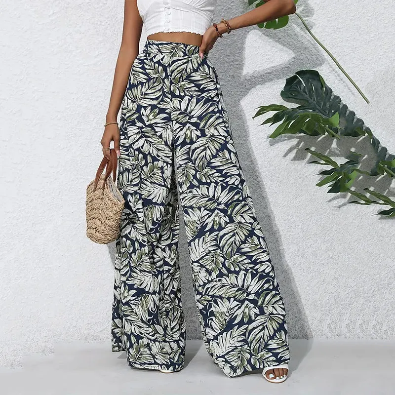 Olivenorma Damenhose mit tropischem Blätterprint, hohem Bund und weitem Bein