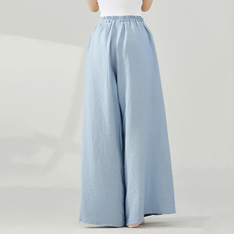 Olivenorma – Drapierte Yoga-Hose aus Viskose mit weitem Bein
