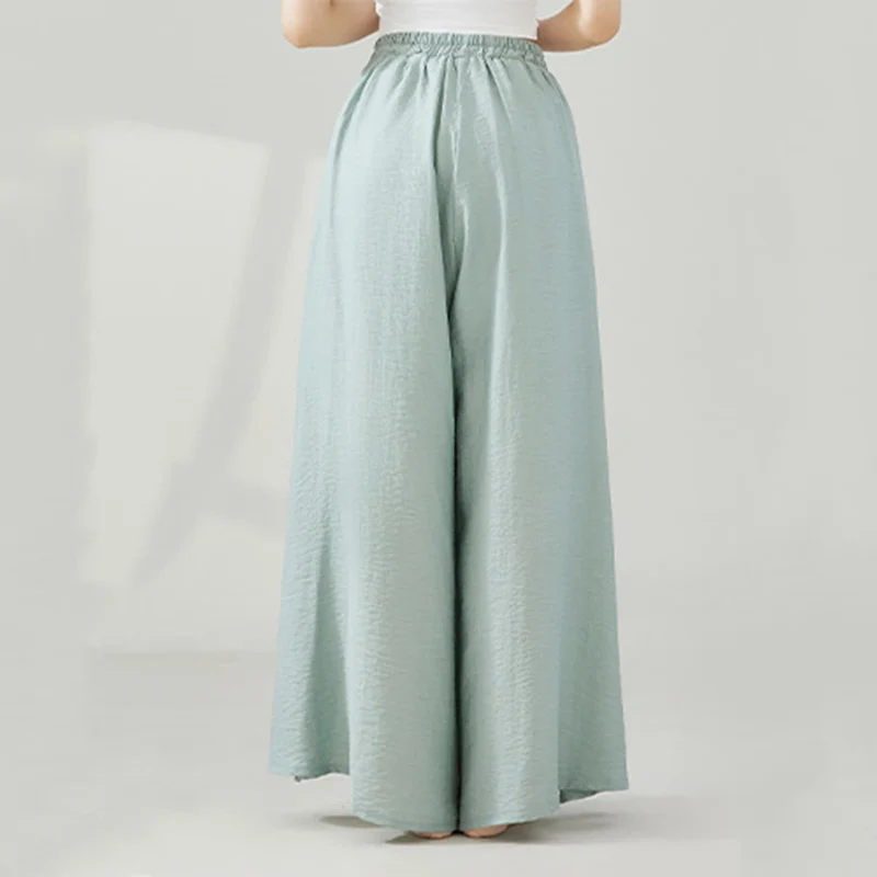 Olivenorma – Drapierte Yoga-Hose aus Viskose mit weitem Bein